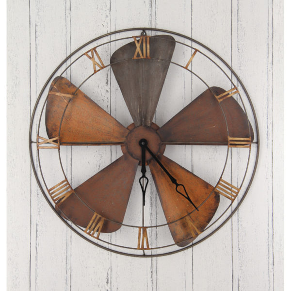 Industrial style fan clock, orange/brass rusty look propeller as a clock face.