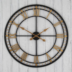 wall hanging antique bronze clock with gold Roman numerals and clock hands