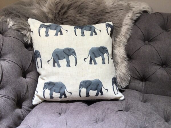 feather filled cushion with elephant repetitive design