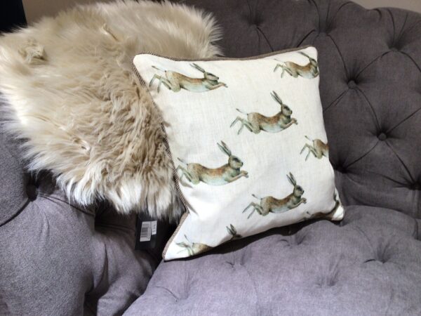 Hare Motif Cushion with cream background