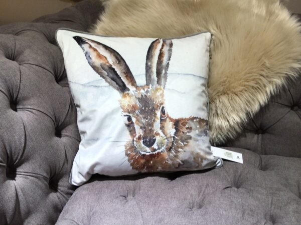 Hare image feather filled cushion with cream background