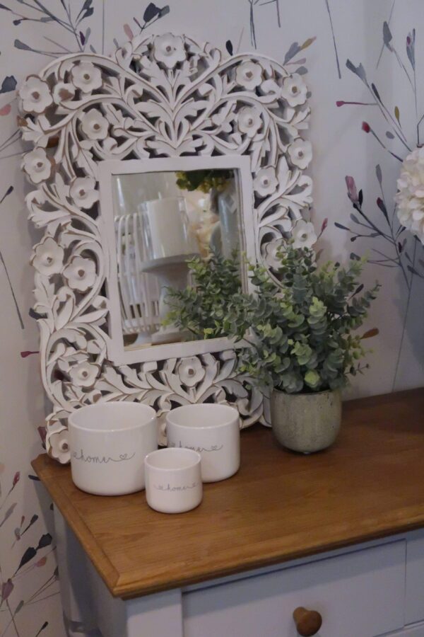 White carved wood mirror