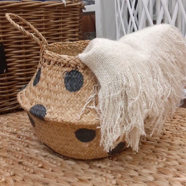 Vogue Ivory Throw in a seagrass polka dot basket